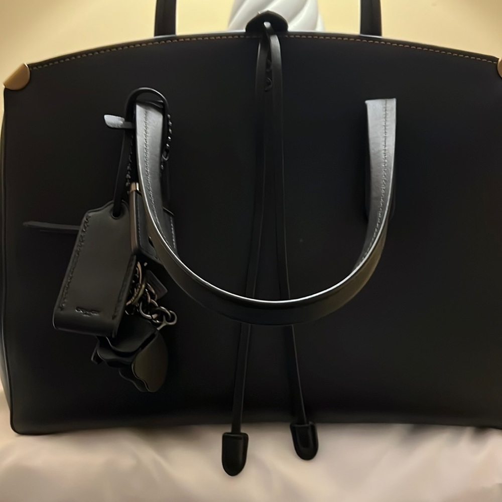 Coach Cooper  Carryall black smoke free environment rose is not included